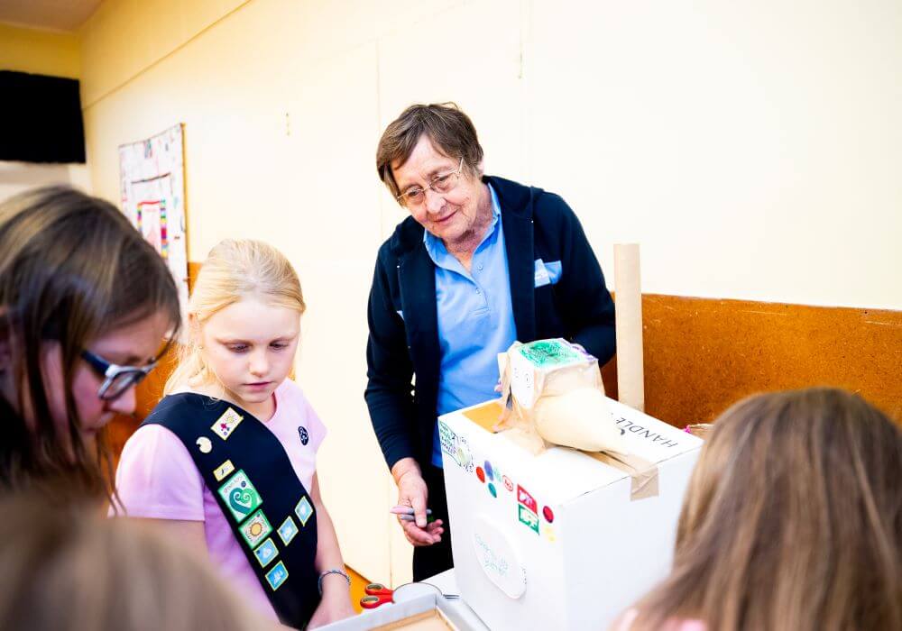 Woman with girl guides